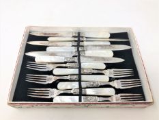 A twelve piece mother of pearl and EPNS dessert knife and fork service,