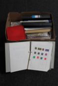 A box of files, albums of stamps,