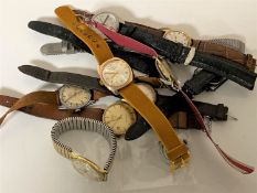 Eleven various gent's wristwatches including Accurist, Timex, Roamer etc,