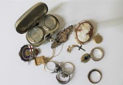 A box of antique cameo brooch in gold mount, plated sovereign case, silver and gold plated rings,