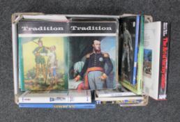 A box of nine hardback volumes relating to toy soldiers and a quantity of Traditions magazines