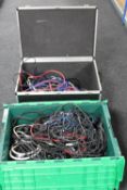A flight box and large storage crate containing a large quantity of electrical cables