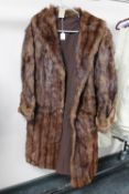 A vintage 3/4 length fur coat