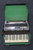 An Hohner accordion in carry case