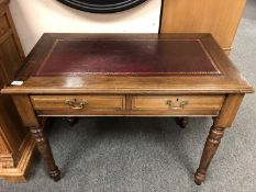 A Victorian mahogany two drawer desk,