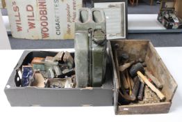 A box of jerry can, three bench vices, drill bit,