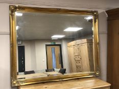 A gilt framed overmantel mirror,