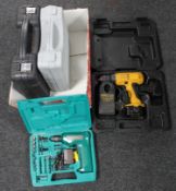 A box of four boxed hammer drills with chargers including Dewalt etc