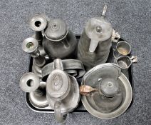 A tray of antique pewter candlesticks,