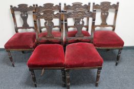 A set of six carved Victorian mahogany dining chairs