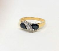 An 18ct gold sapphire and diamond ring