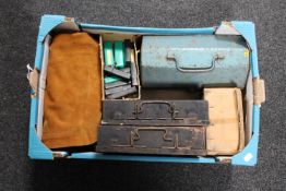 A box of two military first aid kits, pair of leather chaps, boxed Optimus stove,