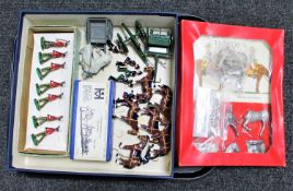 A tray of painted and un-painted mid twentieth century soldiers to include Hinchcliffe models,