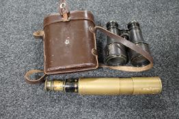 An antique lacquered brass telescope marked Aitchison & Co. Opticians 428 Strand London W.C.