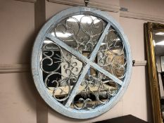 A shabby-chic wood and metal mirror,