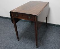 A Victorian inlaid mahogany Pembroke table fitted a drawer
