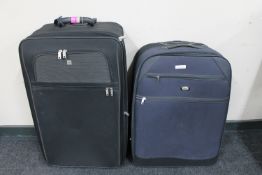 Two luggage cases together with two cabin cases