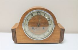 A 1930's walnut cased Art Deco mantel clock