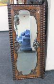 A Victorian rosewood overmantel mirror (glass damaged)