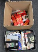 A box of Triang and Lima railway boxes and two plastic tubs of books,
