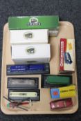 A tray of boxed and unboxed vehicles including Atlas buses and trams,
