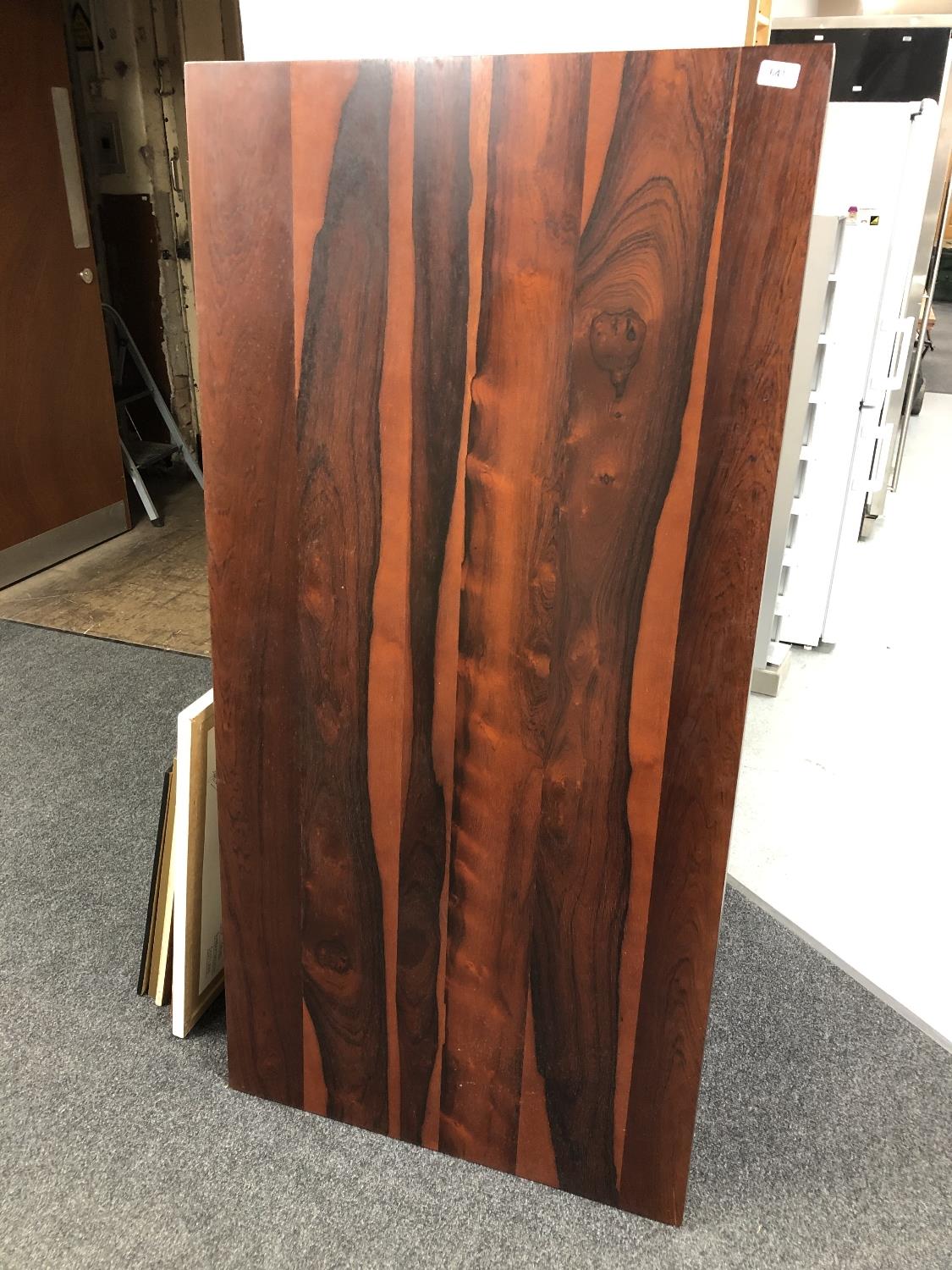 A mid 20th century rosewood effect table top