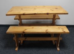 A pine kitchen table and two benches
