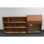 A set of mid 20th century pine open shelves and a teak bureau