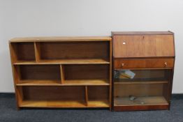 A set of mid 20th century pine open shelves and a teak bureau