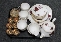 A tray of twenty-one piece Colclough rose patterned tea service together with six Japanese lustre