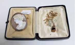 An antique cameo brooch in gold mount together with a ship's lamp pendant on gilt chain