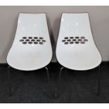 A pair of Italian Calliganis Jam dining chairs on metal legs