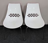 A pair of Italian Calliganis Jam dining chairs on metal legs