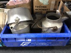 A box of two galvanised milk churns,