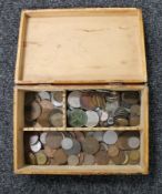 A wooden trinket box containing pre decimal British coins,