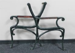 A pair of cast iron bench ends