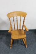 A child's pine farmhouse rocking chair