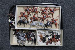 A tray of mid twentieth century hand painted and un-painted lead figures on horseback,