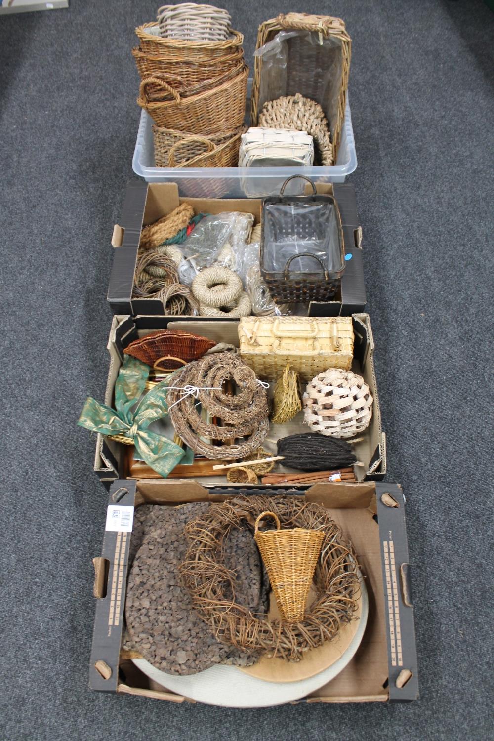 Four boxes of flower arranging items and wicker baskets