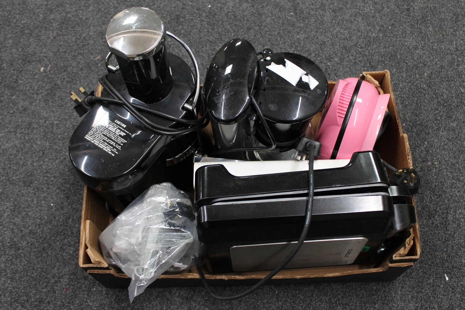 A box of kitchen electricals, juicer, coffee maker,