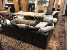 A suede and cloth modular lounge suite with scatter cushions