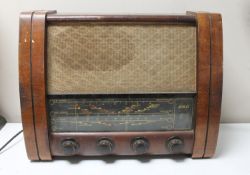 An early twentieth century walnut cased GEC valve radio