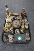 A tray of antique metal ware including brass nutcrackers, first aid tin, pewter tankards,