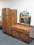 A 1930's walnut double door wardrobe and dressing chest