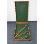An antique mahogany folding bar billiards table