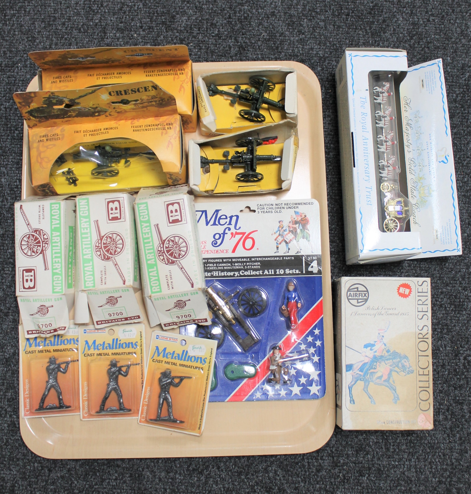 A tray of boxed Crescent and Britains artillery guns, airfix, matchbox, state coach,