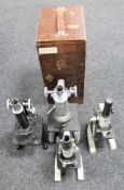 A Prior microscope in wooden case together with three other microscopes by Motic and Watson of