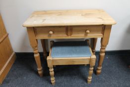 A stripped pine dressing table and stool