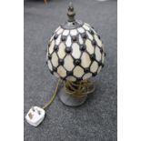 A Tiffany style table lamp with shade