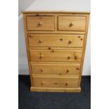 A pine six drawer chest